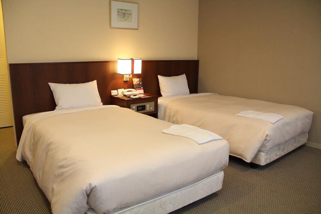 Hotel Sunroute New Sapporo Zimmer foto