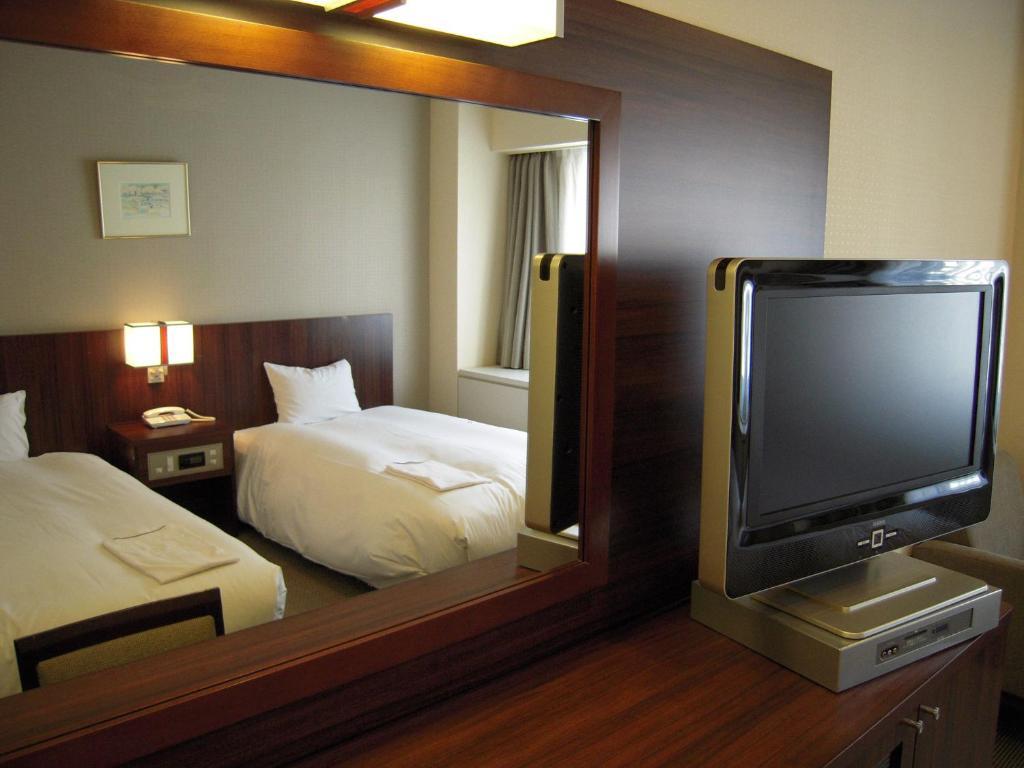 Hotel Sunroute New Sapporo Zimmer foto